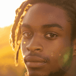 frankly_being_realistic_portrait_of_a_young_black_man_with_ha_24018514-177c-4cd0-9ea8-f58ad9df67fe_3